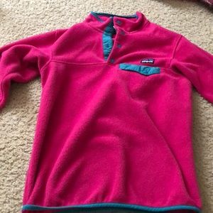 pink and blue Patagonia button pullover